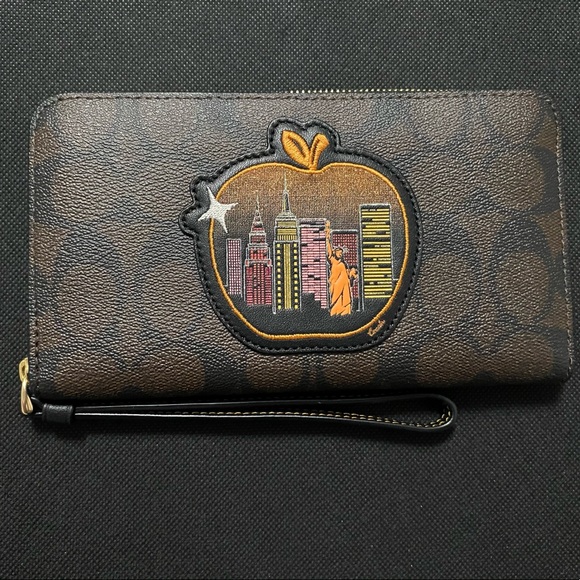Coach Handbags - Coach signature canvas apple skyline wallet.